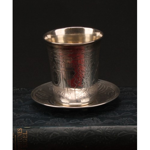 166 - A Russian silver beaker and stand, bright-cut engraved with strapwork and wrigglework, gilt interior... 