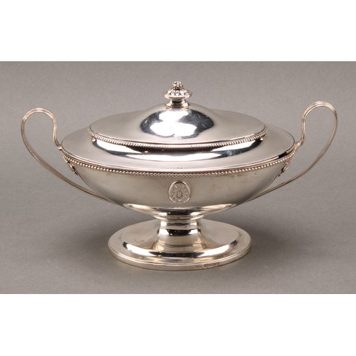 395 - A set of four George III Neo-Classical silver oval pedestal sauce tureens and covers, applied with s... 