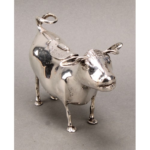 308 - A Dutch silver cow creamer, hinged cover, 14cm long, c.1900, 164g