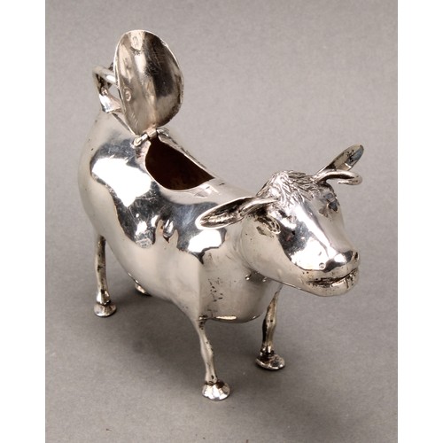 308 - A Dutch silver cow creamer, hinged cover, 14cm long, c.1900, 164g