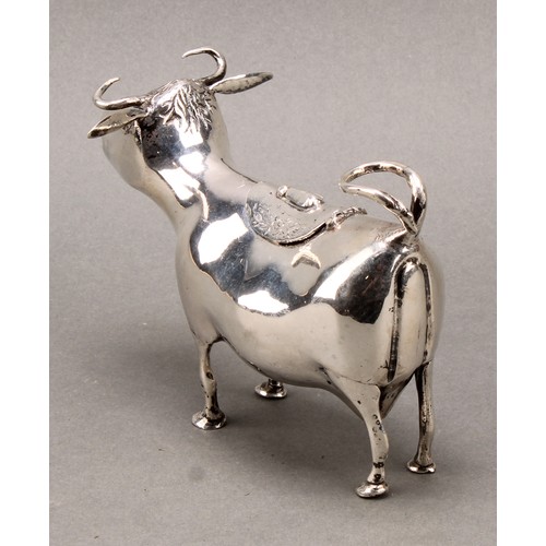 308 - A Dutch silver cow creamer, hinged cover, 14cm long, c.1900, 164g