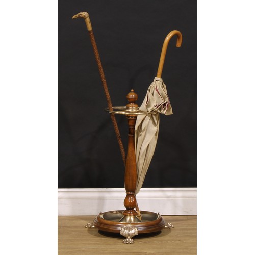 1585 - A 19th century design walnut and brass-mounted walking stick stand, turned baluster column, quartere... 