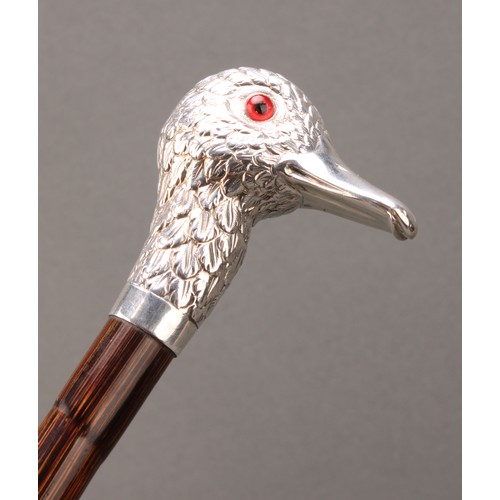 1752 - A Victorian Brigg type silver mounted walking stick, the handle as the head of a duck, palmwood cane... 