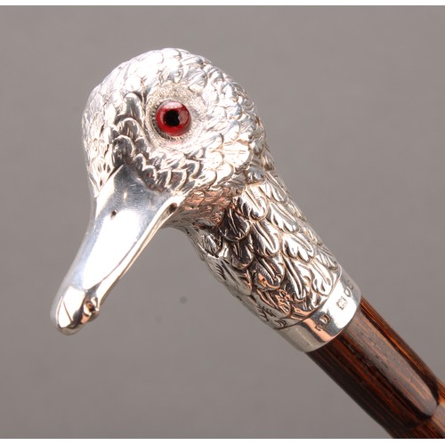 1752 - A Victorian Brigg type silver mounted walking stick, the handle as the head of a duck, palmwood cane... 