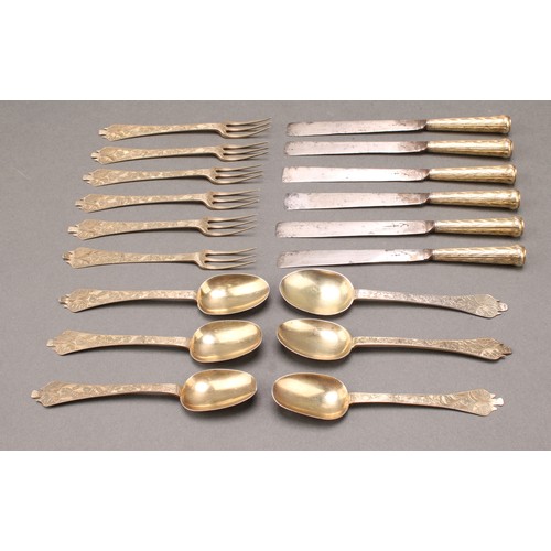 6 - A rare 17th century service of silver-gilt children's or doll's toy Trefid pattern flatware, compris... 