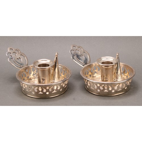 156 - A pair of William IV/early Victorian silver chamber sticks, pierced galleries and lug handles, conic... 