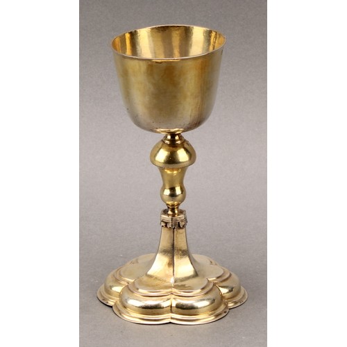 102 - A 17th century German silver-gilt chalice, bucket shaped bowl, knopped stem, hexafoil base, 15.5cm h... 