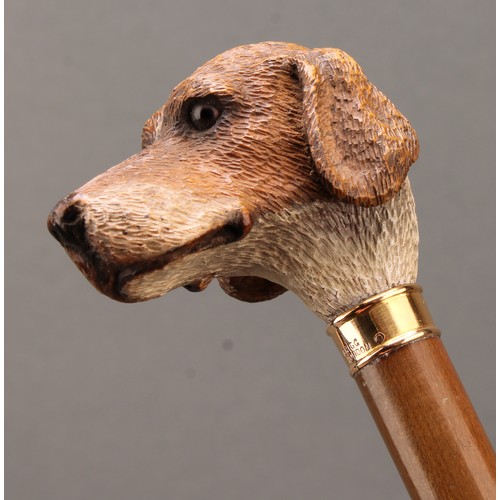 1761 - An early 20th century walking stick or cane, by Brigg, the handle carved as the head of a hound dog,... 