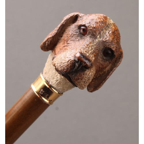 1761 - An early 20th century walking stick or cane, by Brigg, the handle carved as the head of a hound dog,... 