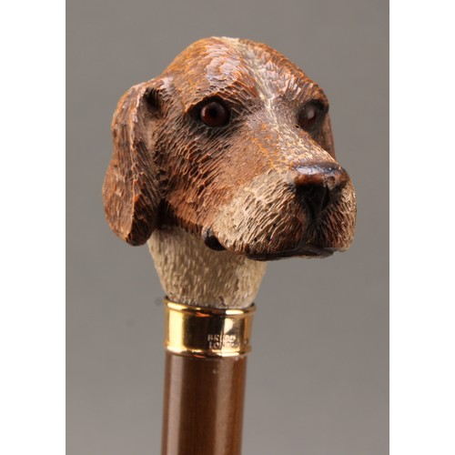 1761 - An early 20th century walking stick or cane, by Brigg, the handle carved as the head of a hound dog,... 