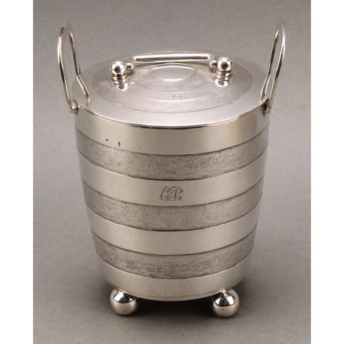 373 - A pair of early 19th century Indian Colonial silver faux-coopered butter coolers and covers, ball fe... 