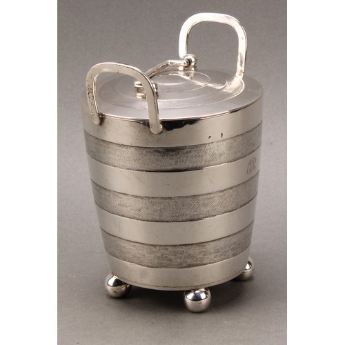 373 - A pair of early 19th century Indian Colonial silver faux-coopered butter coolers and covers, ball fe... 