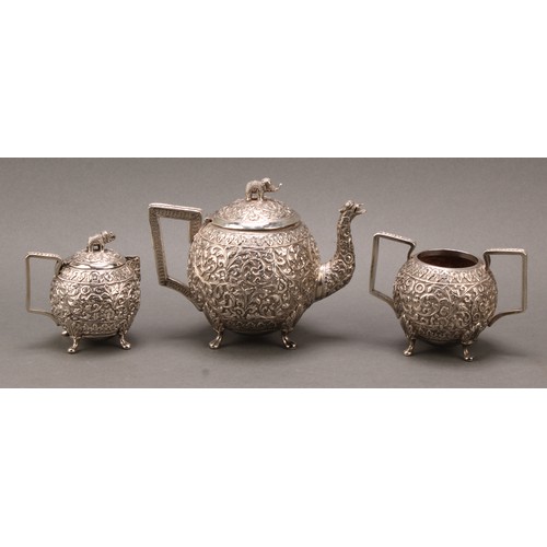 485 - An Indian silver three-piece bachelor's tea service, comprising teapot, milk jug and sugar basin, pr... 