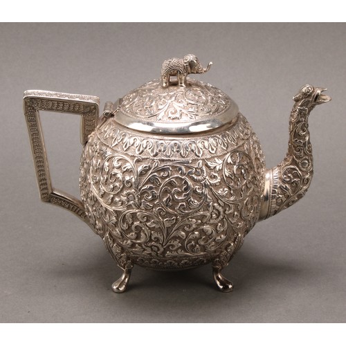 485 - An Indian silver three-piece bachelor's tea service, comprising teapot, milk jug and sugar basin, pr... 