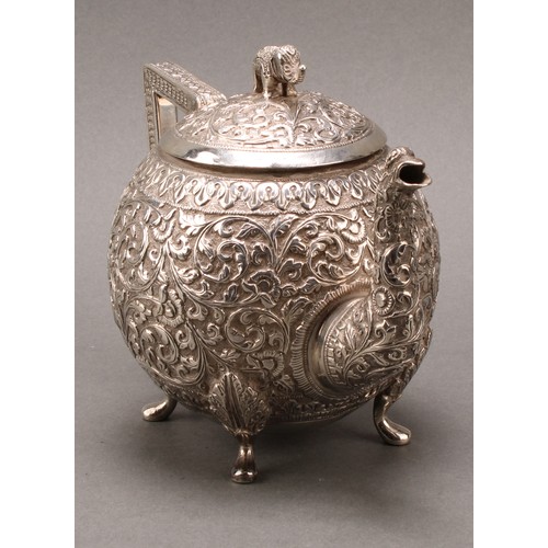 485 - An Indian silver three-piece bachelor's tea service, comprising teapot, milk jug and sugar basin, pr... 