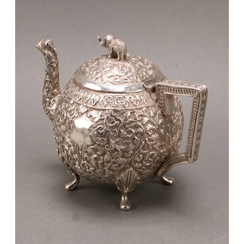 485 - An Indian silver three-piece bachelor's tea service, comprising teapot, milk jug and sugar basin, pr... 