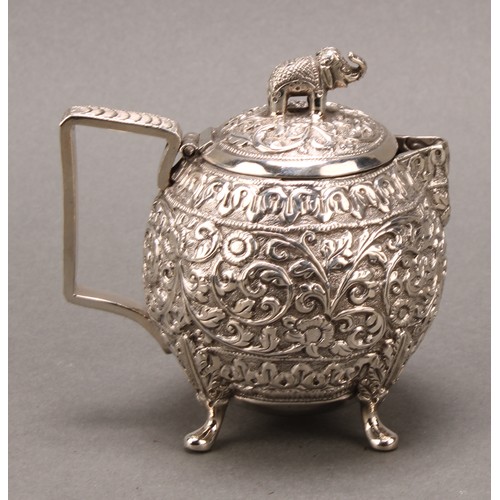 485 - An Indian silver three-piece bachelor's tea service, comprising teapot, milk jug and sugar basin, pr... 