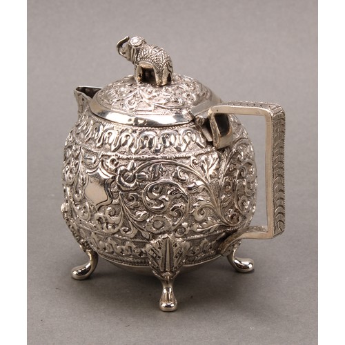 485 - An Indian silver three-piece bachelor's tea service, comprising teapot, milk jug and sugar basin, pr... 