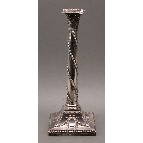 385 - A pair of George III silver Corinthian column candlesticks, chased in the Neo-Classical taste with r... 