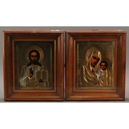 197 - A pair of Russian silver and silver-gilt Orthodox icons, depicting Madonna and Child, and Christ Pan... 