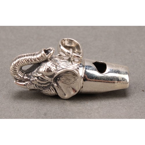 426 - A sterling silver novelty whistle, as an elephant, 4cm long