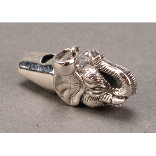 426 - A sterling silver novelty whistle, as an elephant, 4cm long