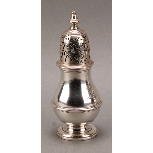 1497 - A pair of unusual George I silver pear shaped casters, knop finials, the bell shaped covers with rar... 