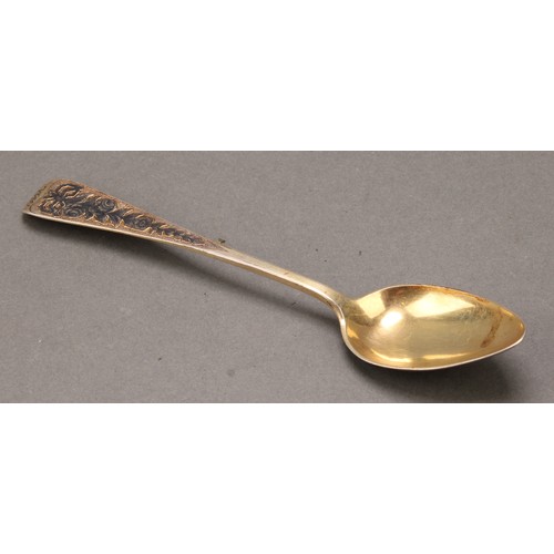 11 - An 18th century Russian silver-gilt and niello spoon, 18cm long