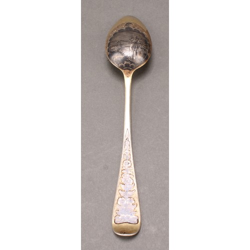 11 - An 18th century Russian silver-gilt and niello spoon, 18cm long