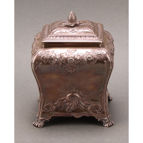 264 - A George II silver bombe shaped tea caddy, chased in the Rococo taste with flowering swags and leafy... 