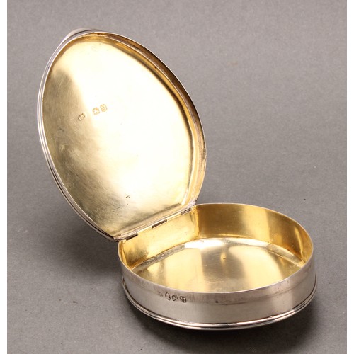 74 - A George III silver oval snuff box, quite plain, hinged cover, gilt interior, 8cm long, Joseph Ash I... 