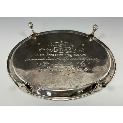 77 - A George III silver oval teapot stand, bright cut and punch beaded collar, ball and claw feet, indis... 