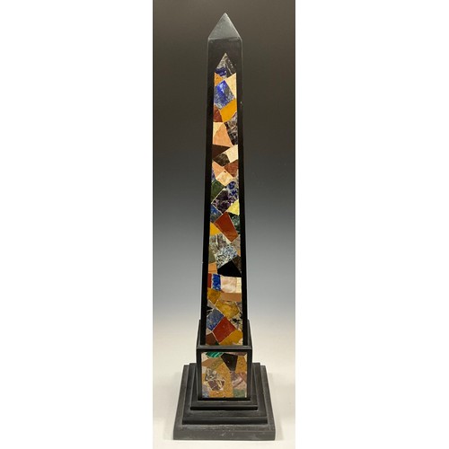 2112 - A granite obelisk, the façade inlaid with malachite, onyx, and other precious stones, stepped square... 