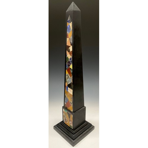 2112 - A granite obelisk, the façade inlaid with malachite, onyx, and other precious stones, stepped square... 