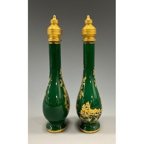 1225 - A pair of Lynton porcelain tear-shaped scent bottles, the green grounds applied with gilt and tooled... 