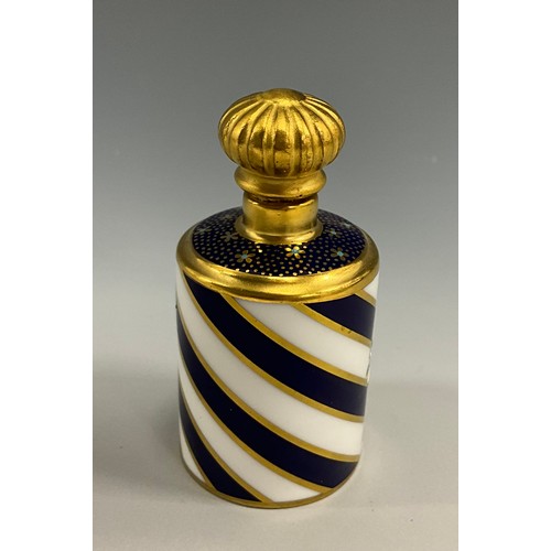 1215 - A Lynton porcelain barrel-shaped scent bottle, painted by Stefan Nowacki, monogrammed, with a musica... 