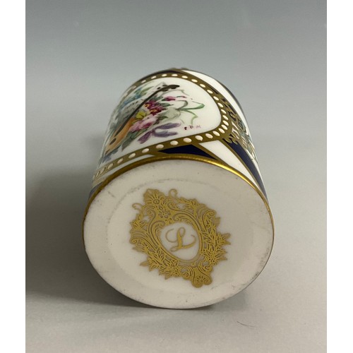 1215 - A Lynton porcelain barrel-shaped scent bottle, painted by Stefan Nowacki, monogrammed, with a musica... 