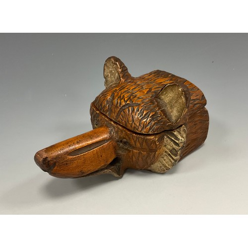 1509 - A 19th century Black Forest novelty inkwell, carved as the head of a Fox, applied eyes, 12cm long.