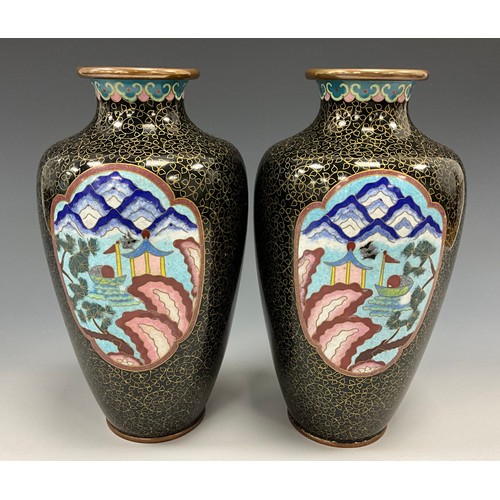 1422 - A pair of Chinese cloisonné enamel vases, of shouldered tapering form, flared rims above ruyi border... 