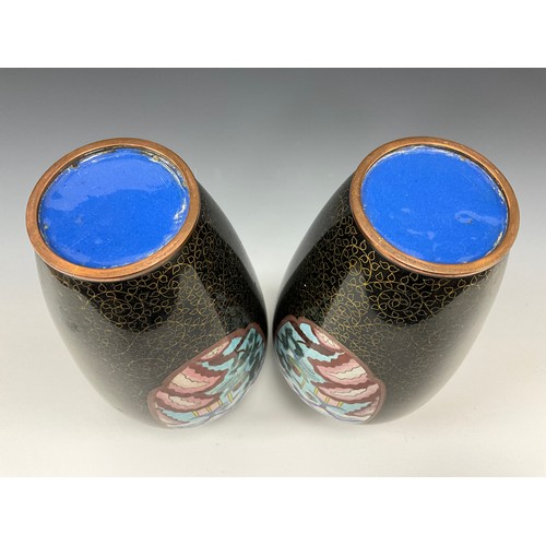 1422 - A pair of Chinese cloisonné enamel vases, of shouldered tapering form, flared rims above ruyi border... 