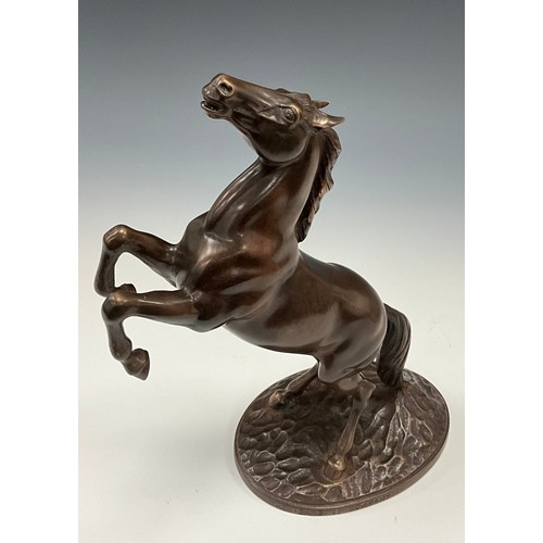 1644 - A dark patinated equestrian bronze, of a mare salient (springing), the base engraved CF. BARKER & SO... 