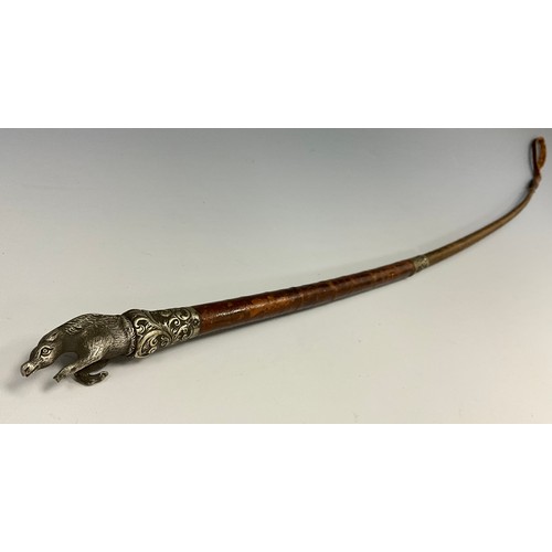 1755 - A Victorian leather riding crop, mounted with a rampant horse bust finial above a white metal pommel... 