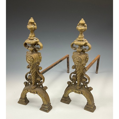 1664 - A pair of Adam Revival brass fire dogs or andirons, urnular finials supported by spirally turned col... 