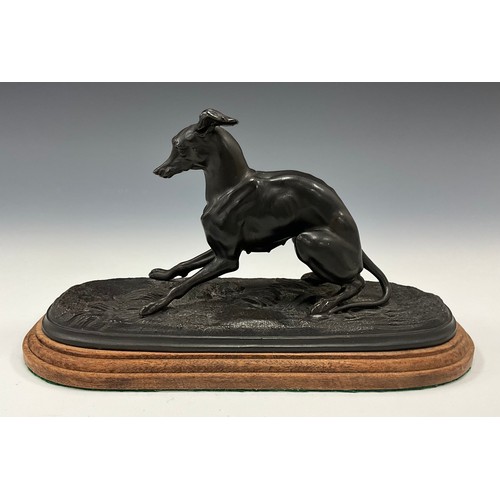 1645 - A dark patinated figural bronze, as a greyhound skidding to a stop, softwood base, 14.5cm high, 25cm... 