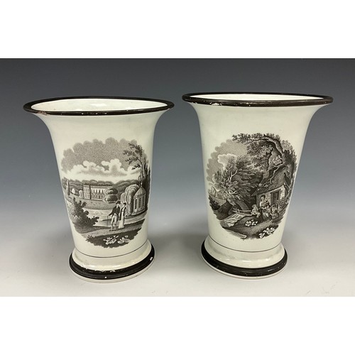 1221 - A pair of George IV porcelain vases, of tapering cylindrical form, flared rims above transfer prints... 