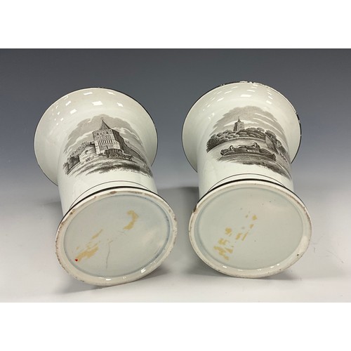 1221 - A pair of George IV porcelain vases, of tapering cylindrical form, flared rims above transfer prints... 