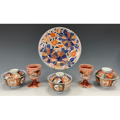 1235 - A set of three Japanese porcelain soup bowls, decorated in the Imari manner, 11cm diameter, marks to... 