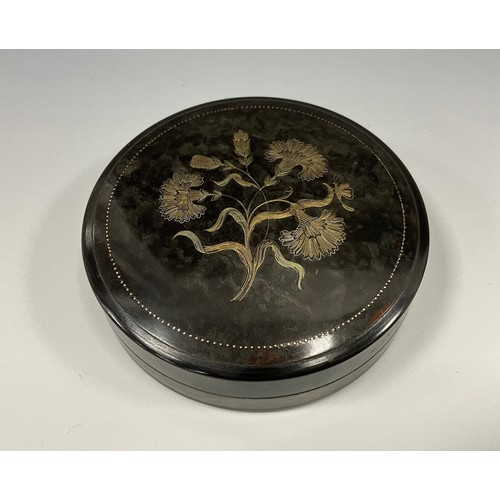 1870 - A Victorian tortoiseshell and pique pill box, the push close cover applied with flowerheads in silve... 