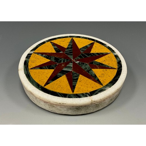 1872 - A white marble and pietra dura circular desk weight, inset with precious stones in the shape of a co... 