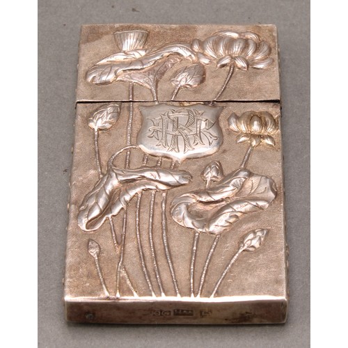 353 - A Chinese silver rectangular visiting card case, chased with lilies and prunus on a textured ground,... 